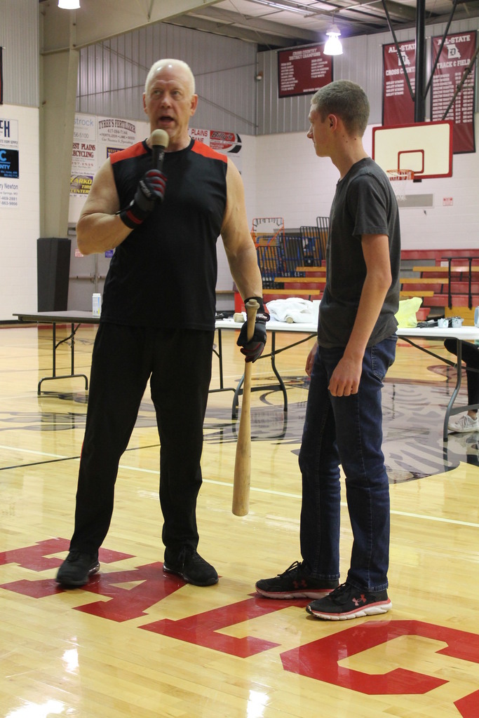 Steve letting students test out the MLB baseball bat he will break