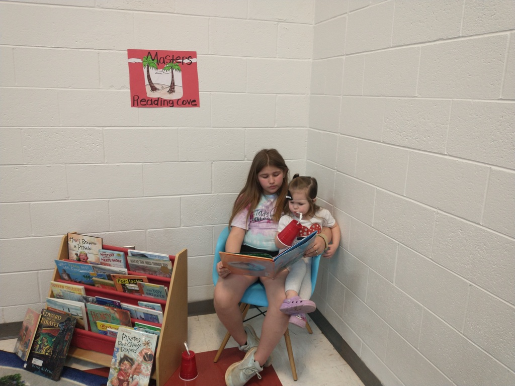 Reading to the littles.