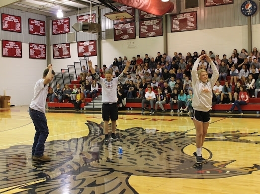 Kendall Lovan, Stephen Williams, & Hanna Bunch playing Simon says during our EOC rewards assembly 